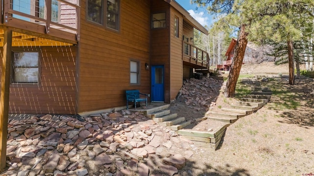 view of home's exterior with a deck