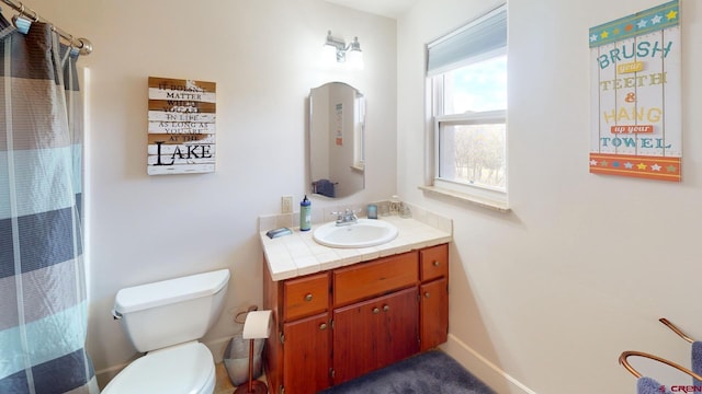 18812 Rd 27, Dolores, CO 81323 - full bath featuring toilet, curtained shower, and vanity