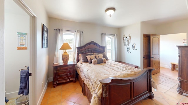 18812 Rd 27, Dolores, CO 81323 - bedroom with baseboards and light tile patterned floors