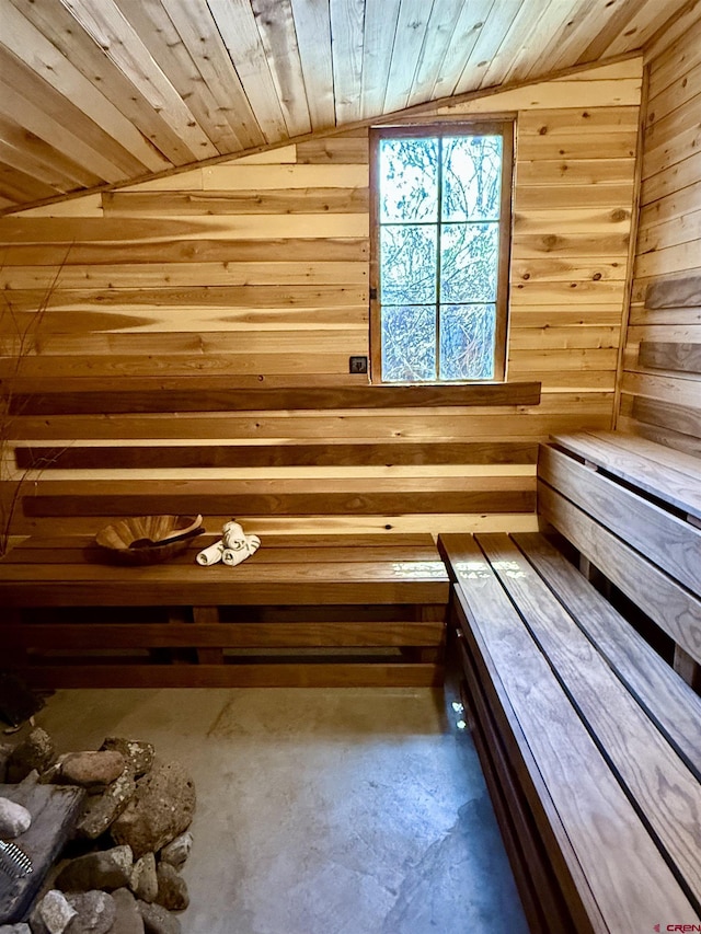 view of sauna featuring concrete floors