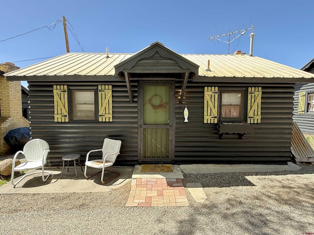view of front of house with metal roof