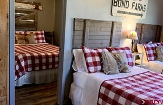bedroom featuring wood finished floors