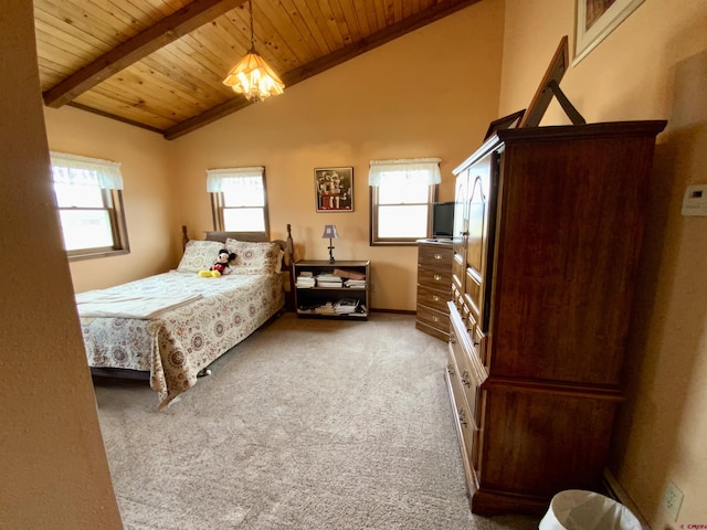 409 Sierra Vista Way, Gunnison, CO 81230 - carpeted bedroom with vaulted ceiling with beams, baseboards, and wooden ceiling