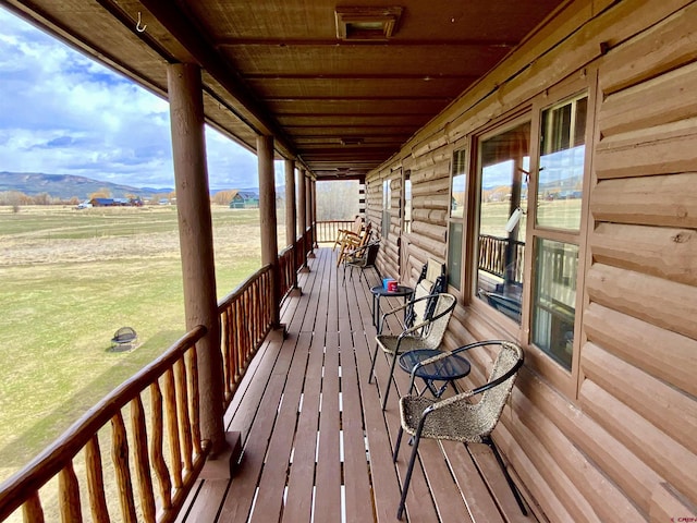 409 Sierra Vista Way, Gunnison, CO 81230 - wooden deck featuring a lawn and a rural view