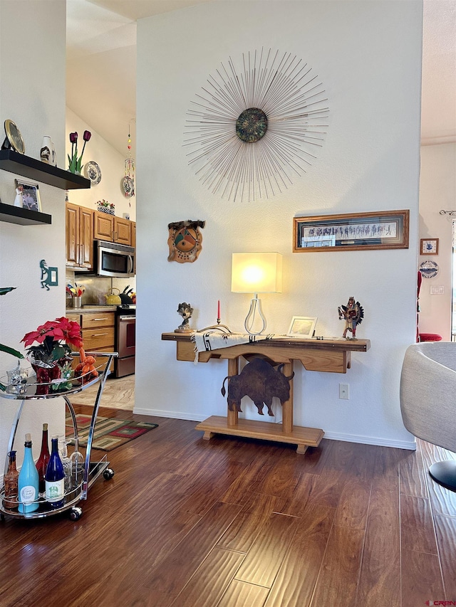interior space with baseboards and light wood-style flooring