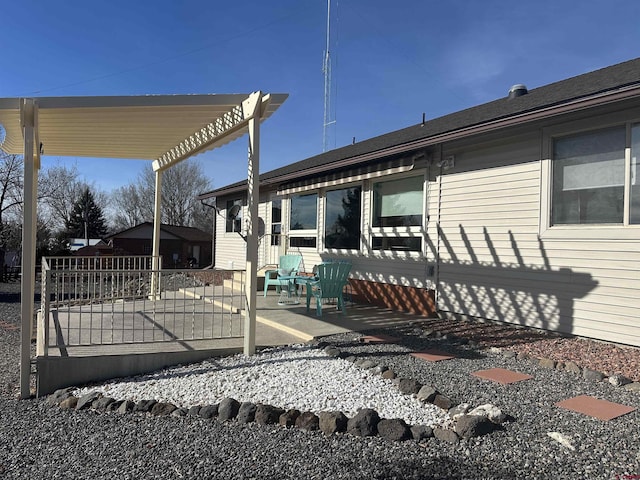 deck with a patio and fence