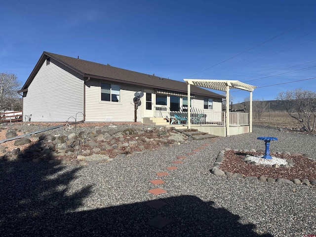 rear view of property with a patio area