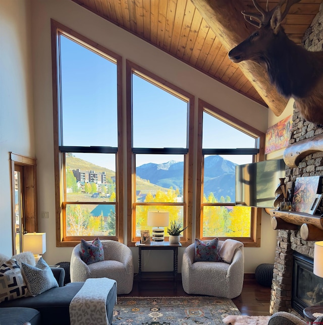 sunroom / solarium with a mountain view