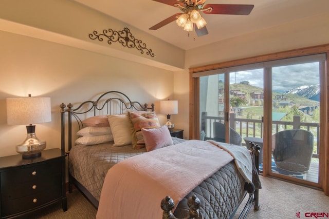 bedroom featuring carpet floors, a ceiling fan, and access to exterior
