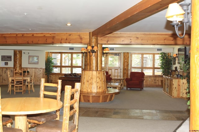 interior space with recessed lighting, wood walls, and visible vents