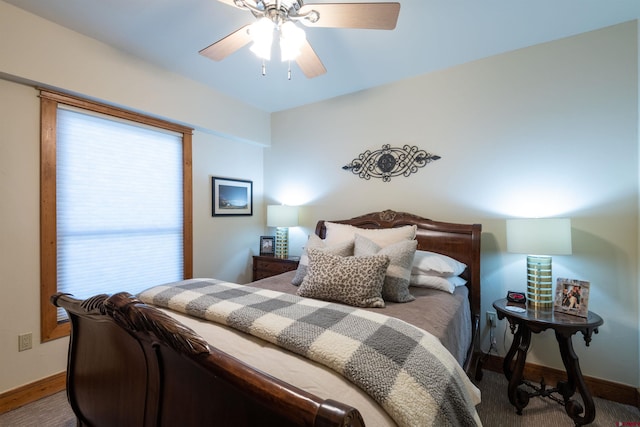 bedroom featuring baseboards and a ceiling fan