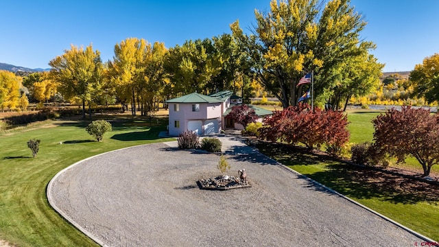 exterior space featuring a garage and driveway