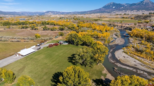 aerial view featuring a mountain view and a rural view