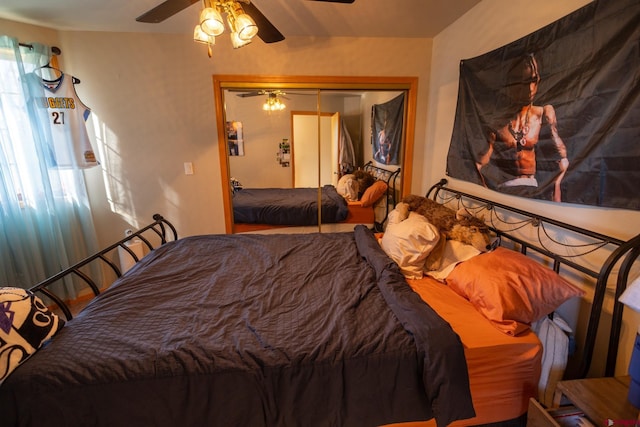 bedroom with a closet and a ceiling fan