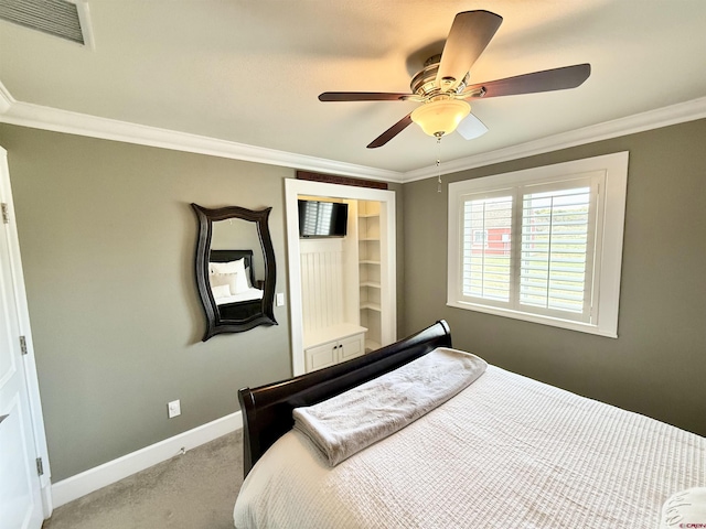 22876 Thunder Mountain Ln, Cedaredge, CO 81413 - bedroom with carpet flooring, baseboards, visible vents, and ornamental molding