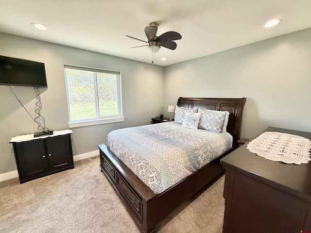 22876 Thunder Mountain Ln, Cedaredge, CO 81413 - bedroom with baseboards, light carpet, a ceiling fan, and recessed lighting