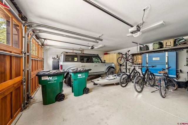 garage featuring a garage door opener