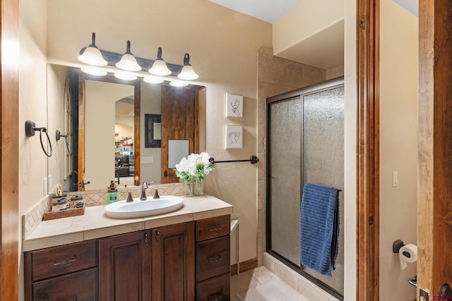 714 Washington Ct, Grand Junction, CO 81507 - full bathroom with a stall shower, vanity, and tile patterned floors