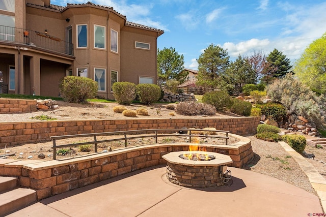 714 Washington Ct, Grand Junction, CO 81507 - view of patio / terrace featuring an outdoor fire pit and a balcony