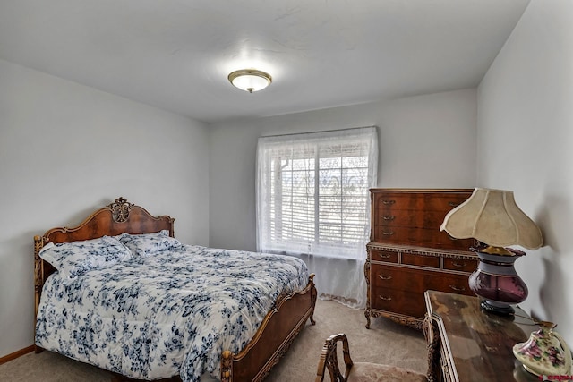 bedroom featuring light carpet