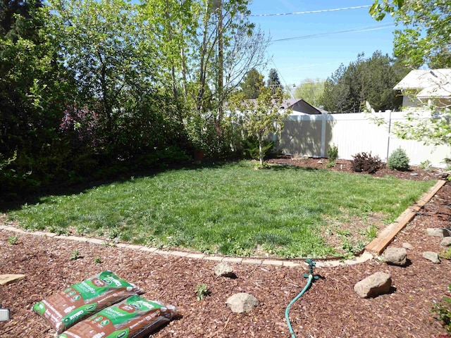view of yard with fence