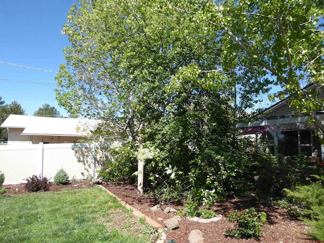 view of yard with fence