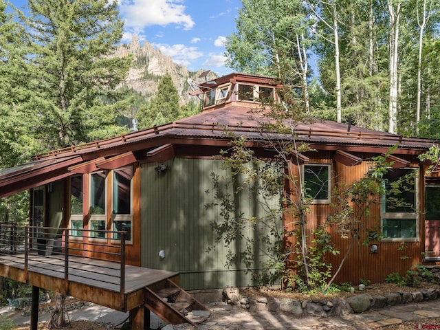 226 Lake Fork Junction Rd, Ophir, CO 81426 - view of property exterior featuring a deck with mountain view