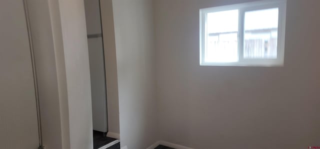 empty room with baseboards