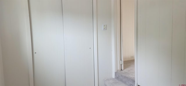 interior space featuring light colored carpet