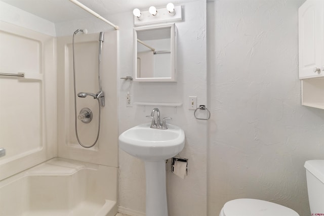 416 Howard St, Delta, CO 81416 - bathroom with toilet and a shower