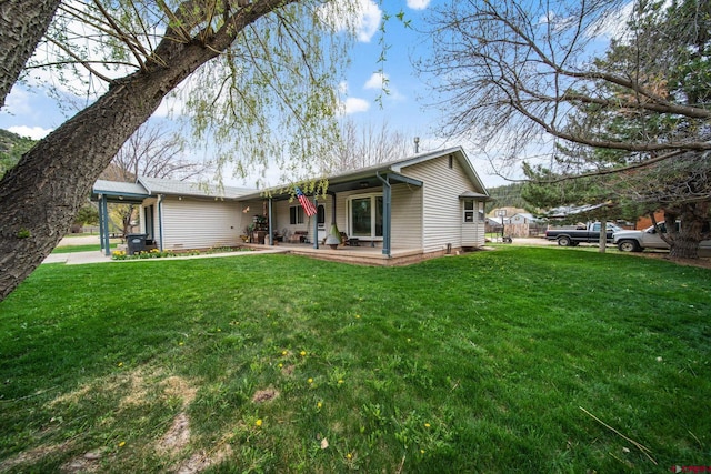 view of front of home featuring a front lawn and a porch
