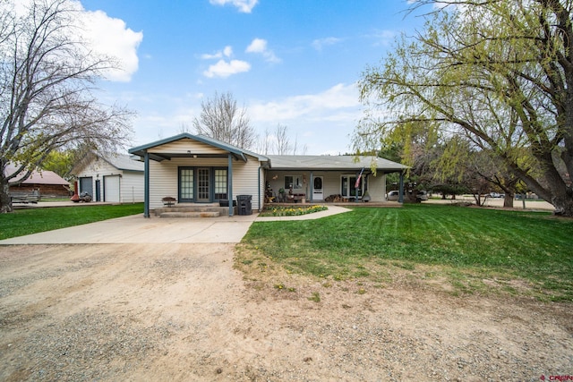 ranch-style house with a porch, a front lawn, and driveway