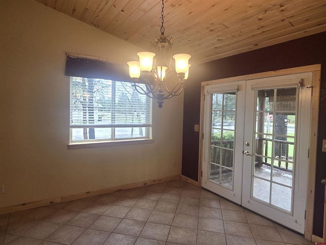 369 Beaver Cir, Pagosa Springs, CO 81147 - unfurnished dining area with a chandelier, plenty of natural light, french doors, wood ceiling, and light tile patterned flooring