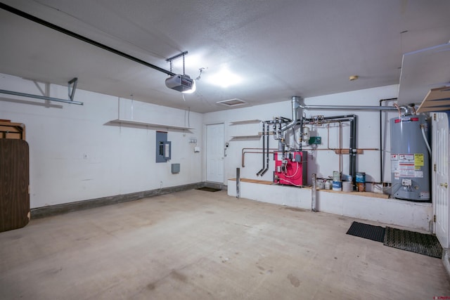 369 Beaver Cir, Pagosa Springs, CO 81147 - garage featuring gas water heater, a garage door opener, electric panel, and a heating unit