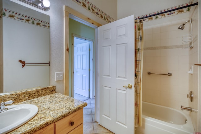 369 Beaver Cir, Pagosa Springs, CO 81147 - bathroom with tile patterned floors, vanity, and washtub / shower combination