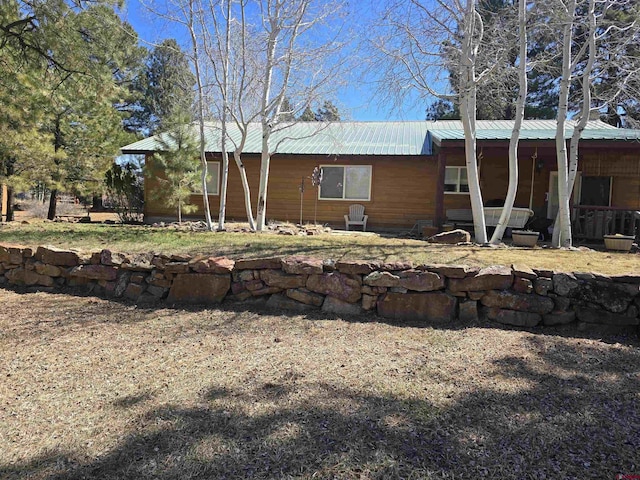 369 Beaver Cir, Pagosa Springs, CO 81147 - view of home's exterior with metal roof