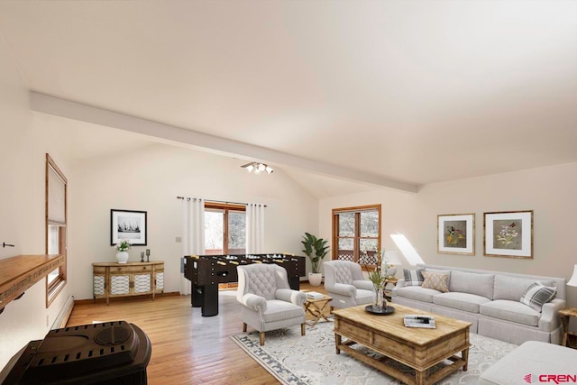 living room featuring baseboards, light wood-type flooring, and vaulted ceiling with beams