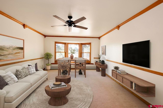 living room with light colored carpet, ornamental molding, baseboards, and a ceiling fan