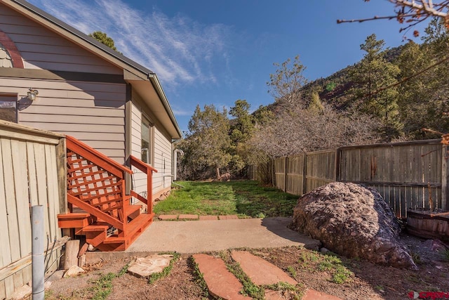 view of yard featuring a fenced backyard and a patio