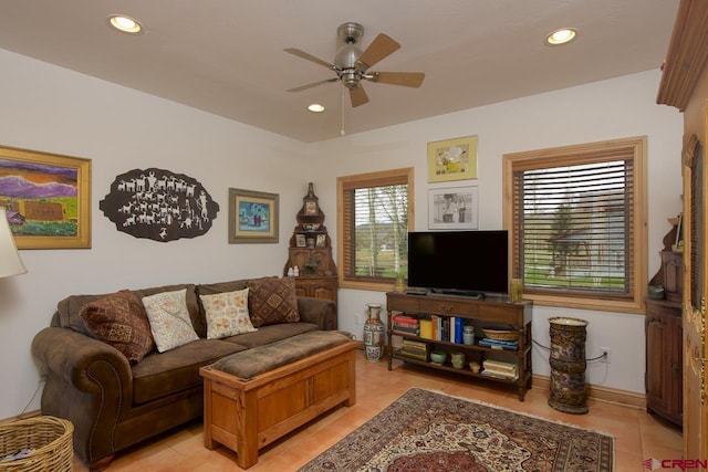 living room featuring a ceiling fan, light tile patterned floors, and recessed lighting
