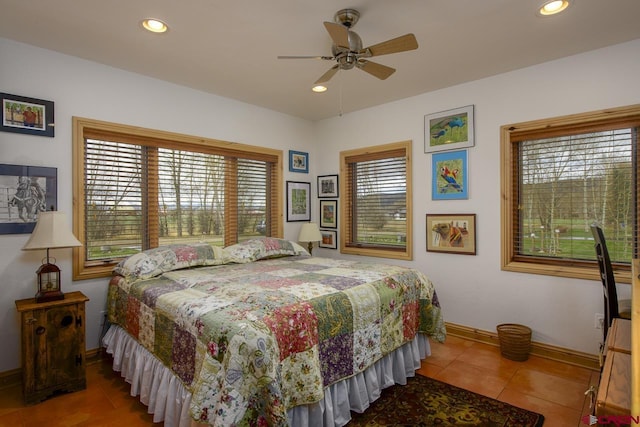 bedroom featuring baseboards, tile patterned flooring, recessed lighting, and a ceiling fan