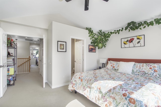 292 E Golf Pl Unit B, Pagosa Springs, CO 81147 - carpeted bedroom with vaulted ceiling, baseboards, and ceiling fan