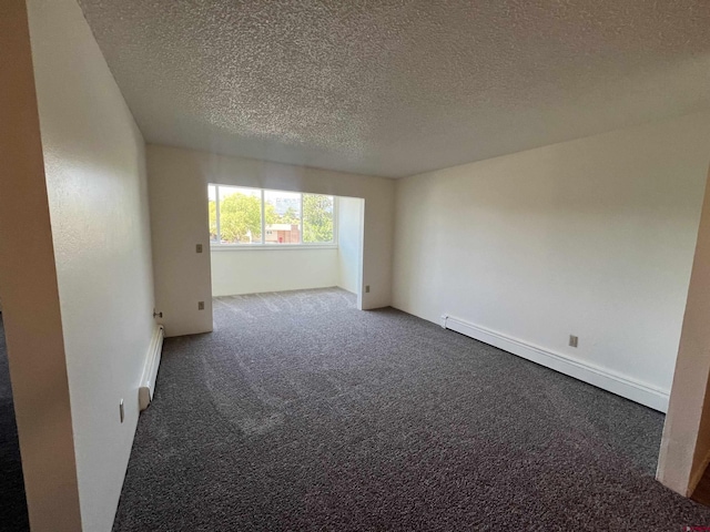 1135 Florida Rd, Durango, CO 81301 - unfurnished room with carpet flooring, a textured ceiling, and baseboard heating