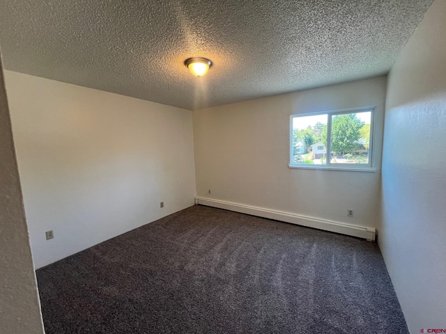 1135 Florida Rd, Durango, CO 81301 - empty room with a baseboard radiator, dark colored carpet, and a textured ceiling