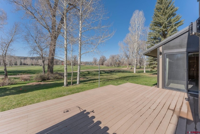 169 Camino Del Rio Unit 8, Gunnison, CO 81230 - wooden deck featuring a yard