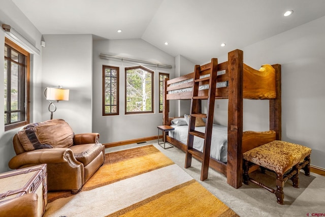 bedroom featuring recessed lighting, vaulted ceiling, light carpet, and baseboards