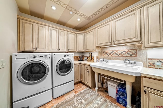clothes washing area with separate washer and dryer, cabinet space, recessed lighting, and light tile patterned floors