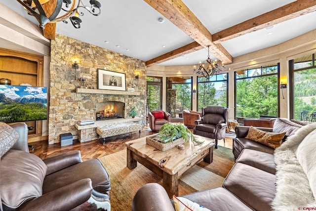 living room featuring a chandelier, beam ceiling, and a fireplace