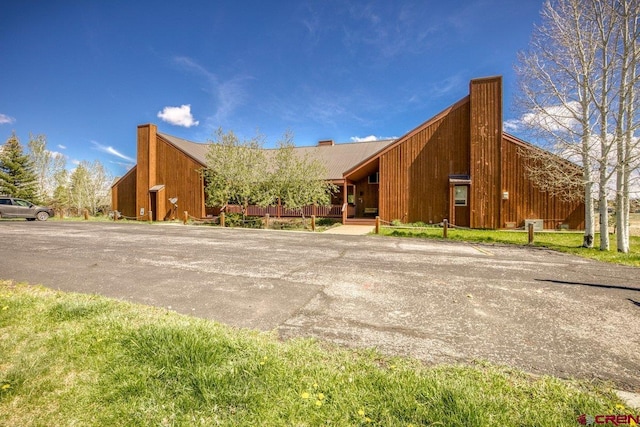 301 Talisman Dr Unit 4319, Pagosa Springs, CO 81147 - view of front facade featuring metal roof and a chimney