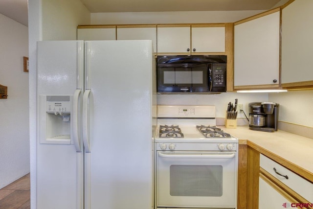 301 Talisman Dr Unit 4319, Pagosa Springs, CO 81147 - kitchen with white appliances and light countertops